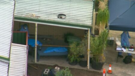 Man charged with murder after body with ‘obvious injury’ found in unit