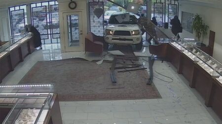 Washington jewelry store owner opens fire after would-be thieves ram truck through storefront