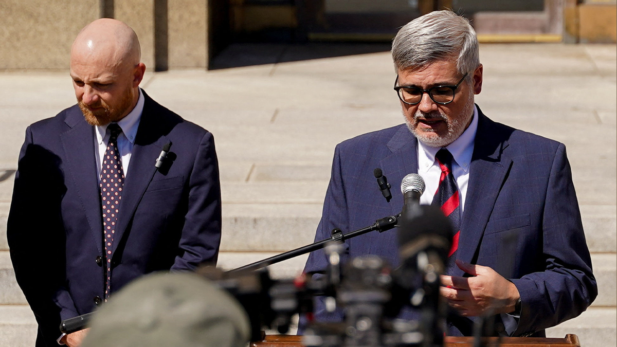 Randy Spivey and Luke Ihnen, attorneys for Christa Pike, deliver a news briefing outside the Davidson County courthouse