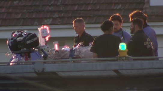 Haines is transported from an airlift to inside the hospital.