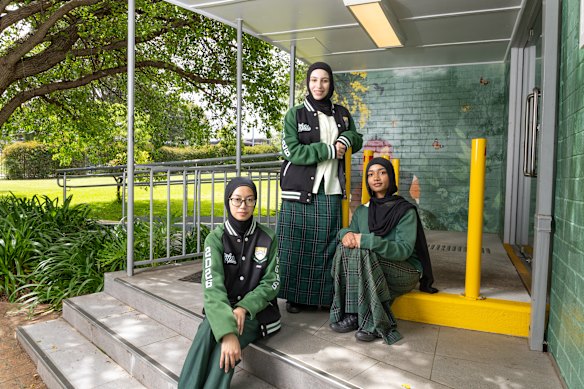 Wiley Park Girls High School students Aulia Harianti, Rayann Hadid and Zafeera Ahsan after sitting their HSC studies of religion 2 exam on Thursday.