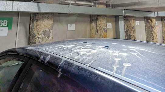 Concrete salts leached from the ceiling of 528 Swanston Street onto the roof of resident Faris ElRayes’ car. 
