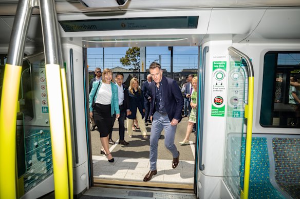 Summer Hill MP Jo Haylen and Premier Chris Minns board a metro train at Sydenham for a ride to Dulwich Hill on Friday morning.