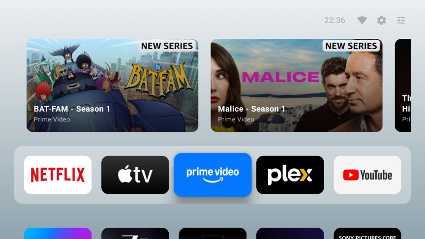 The AT4K Launcher main screen showing Netflix and other apps.