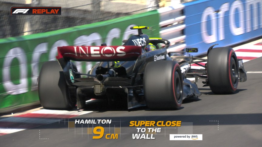 An F1 car moves close to the wall on track, with an insight flagging the action