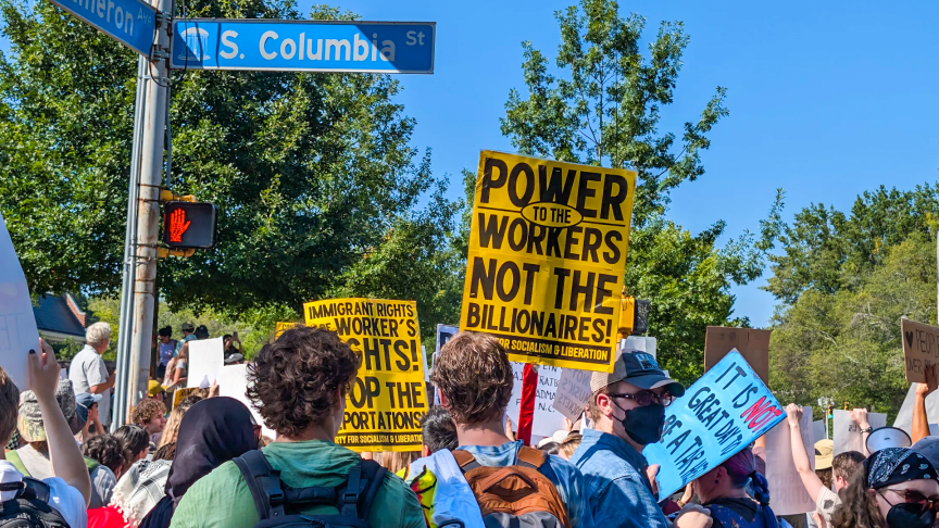 UNC-Chapel Hill students and local residents protested Big Tech outside the G20 forum.