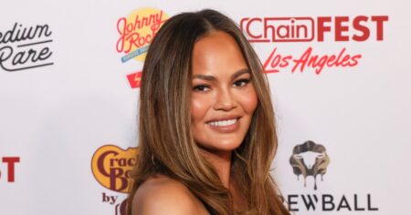 Ditch the Basic Tee! Chrissy Teigen’s Classy Fall Blouse Style Instantly Elevates Jeans — The $15 Look