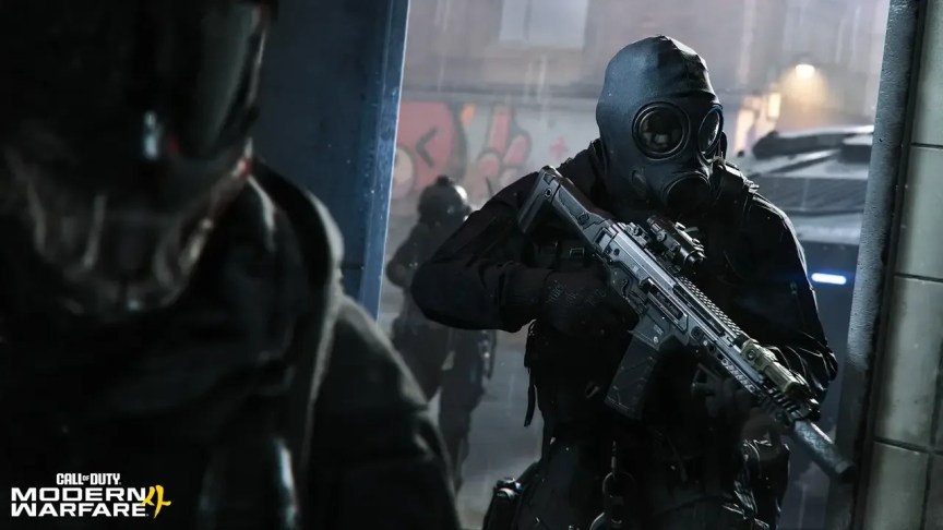 Two men in military uniforms and gas masks march into a room with weapons drawn. A third soldier advances in the background.