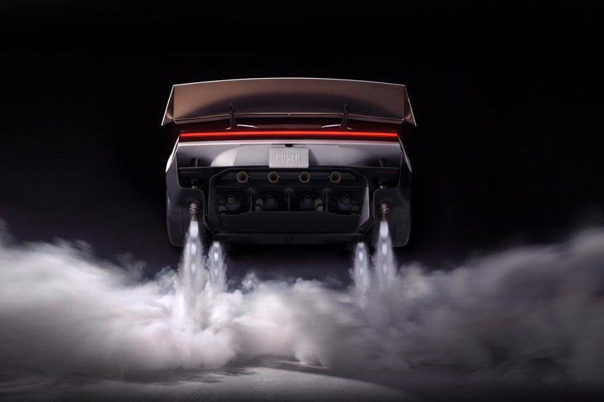 Tesla Roadster lifting into the air with the aid of cold thrusters, leaving a cloud of vapor