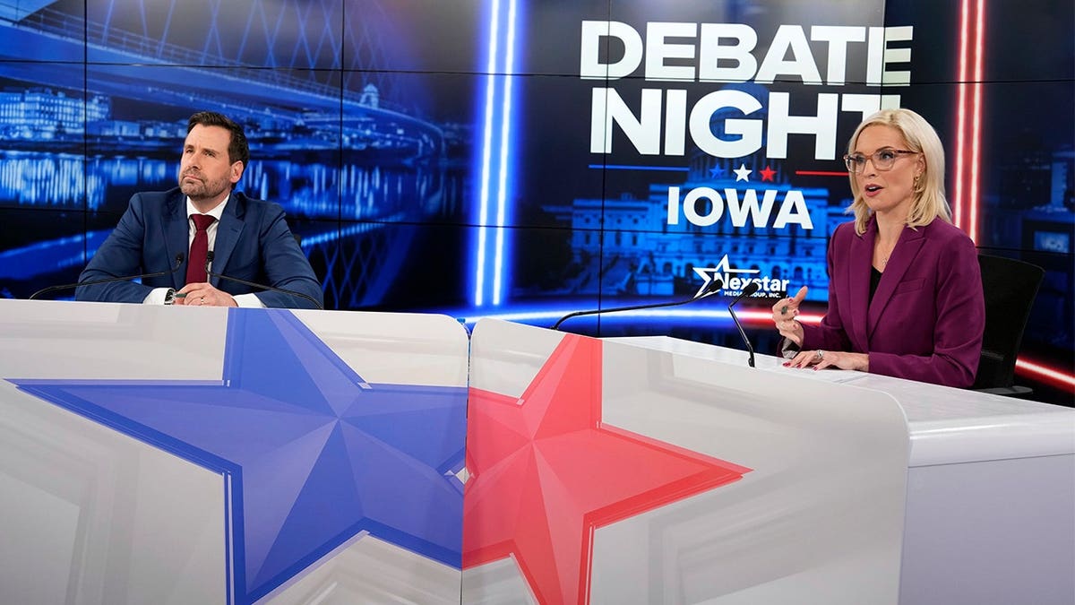 Republican nominee for U.S. Senate Ashley Hinson, right, speaks during a televised debate with Democratic nominee for U.S. Senate Josh Turek at WHO 13, Tuesday, Oct. 13, 2026, in Des Moines, Iowa.