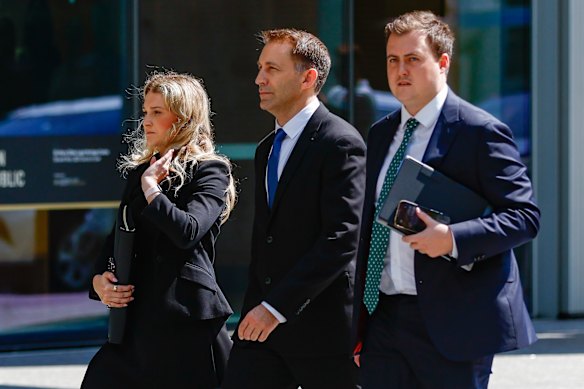 Robert Crawford (centre) with his lawyers at the Supreme Court.