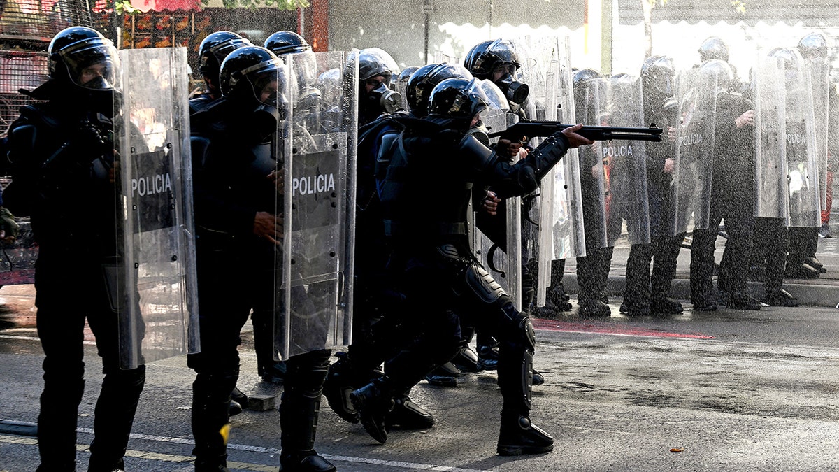 Albania police fire on protesters