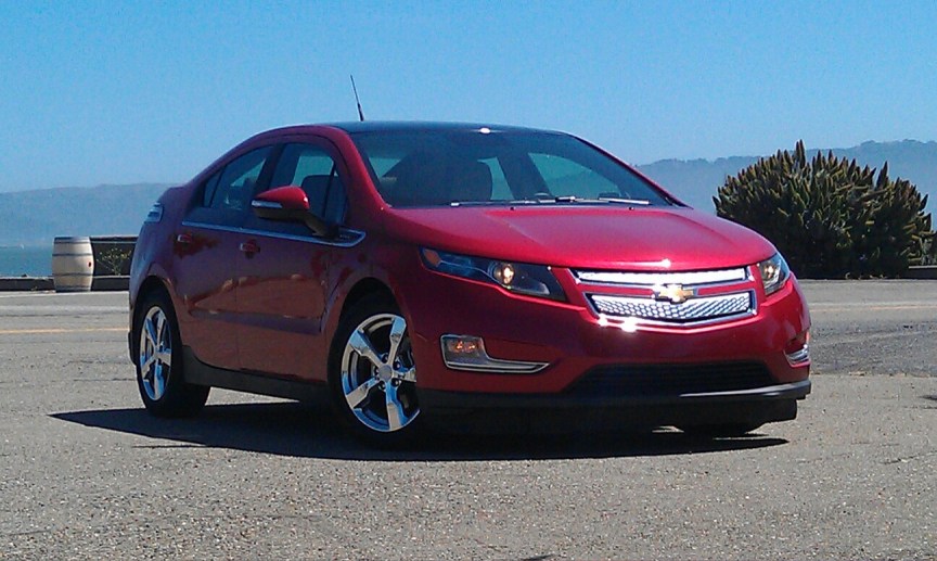 2012 Chevrolet Volt, red, parked in a lot, wheels slightly turned