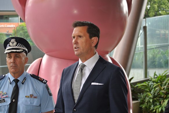 Police Minister Dan Purdie said the state would review laws if it was needed after police investigated the death of a 48-year-old near the site of a dog mauling that same day.