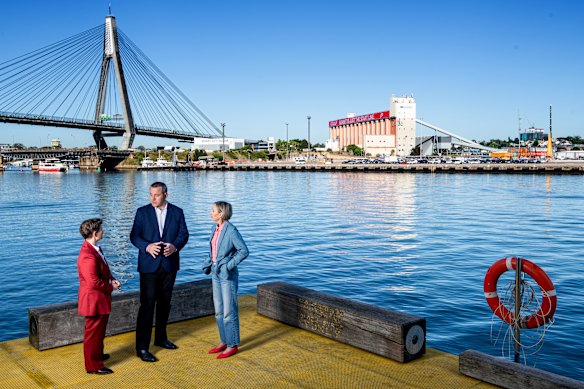 Bays West Delivery Authority acting chief executive Anita Mitchell, Lands and Property Minister Steve Kamper, and NSW government architect Abbie Galvin opposite Glebe Island.