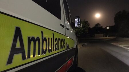 Man in his 20s hospitalised after five-metre jump