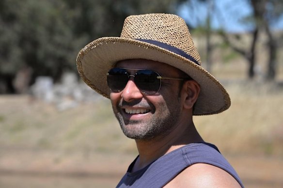 Ajay Malik, 37, suffered serious injuries after being attacked by two bulldog-crosses in a Chermside park.