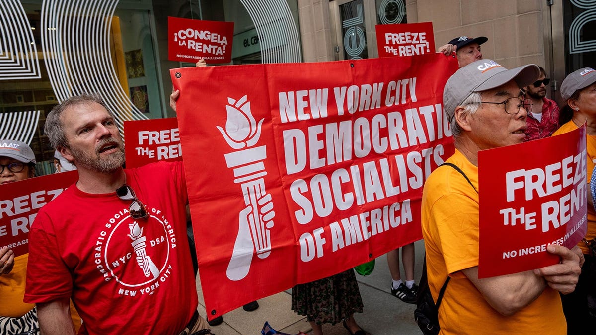 Demonstrators hold a Democratic Socialists of America banner at El Museo del Barrio in New York.