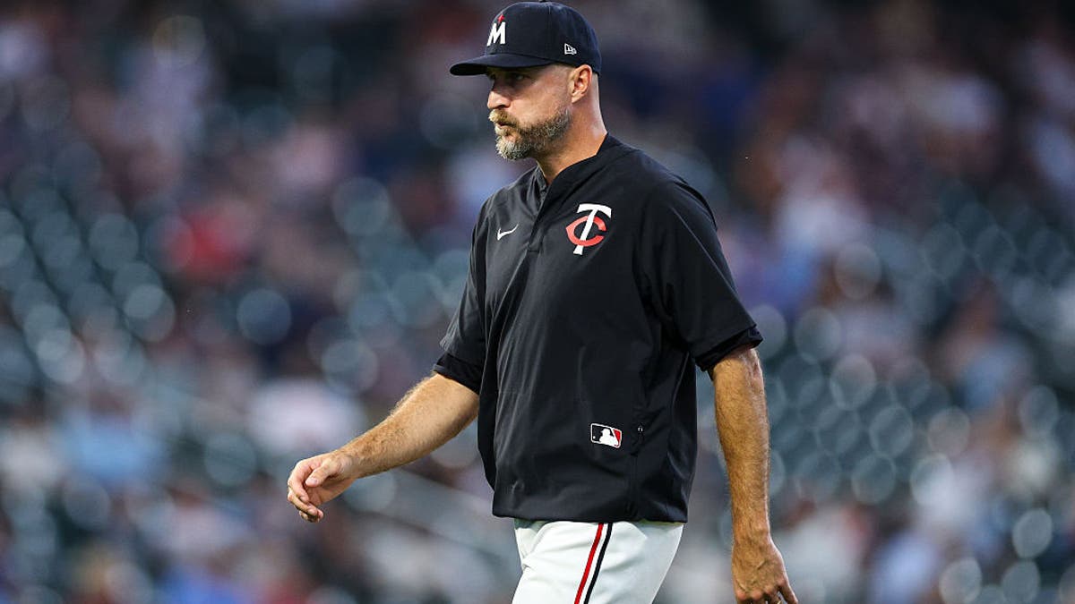 MINNEAPOLIS, MINNESOTA - AUGUST 20: Manager Rocco Baldelli #5 of the Minnesota Twins looks on after making a pitching change against the Athletics in the sixth inning at Target Field on August 20, 2025 in Minneapolis, Minnesota. The Athletics defeated the Twins 4-2 in ten innings. (Photo by David Berding/Getty Images)