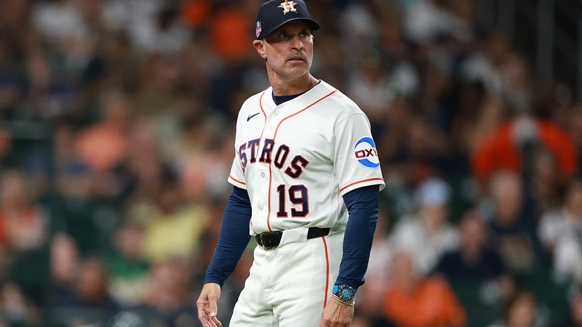 HOUSTON, TEXAS - AUGUST 22: Manager Joe Espada #19 of the Houston Astros walks to the dugout following a pitching change in the sixth inning of the game against the Athletics at Daikin Park on August 22, 2026 in Houston, Texas. (Photo by Kenneth Richmond/Getty Images)