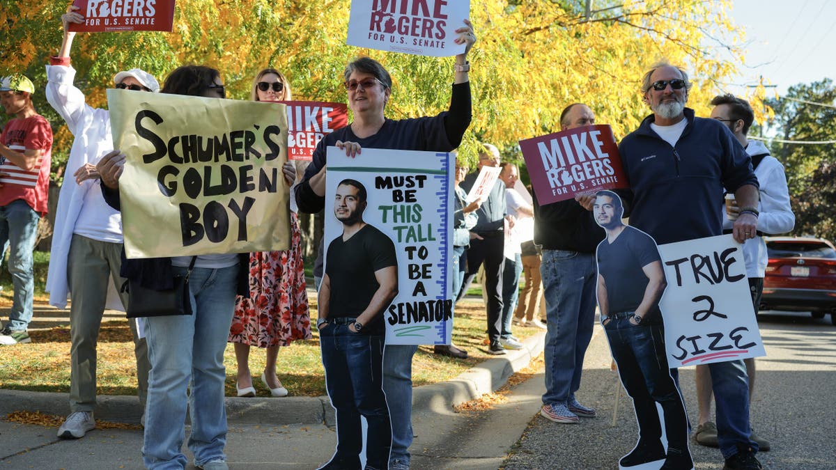 Protesters outside U.S. Senate debate in Michigan