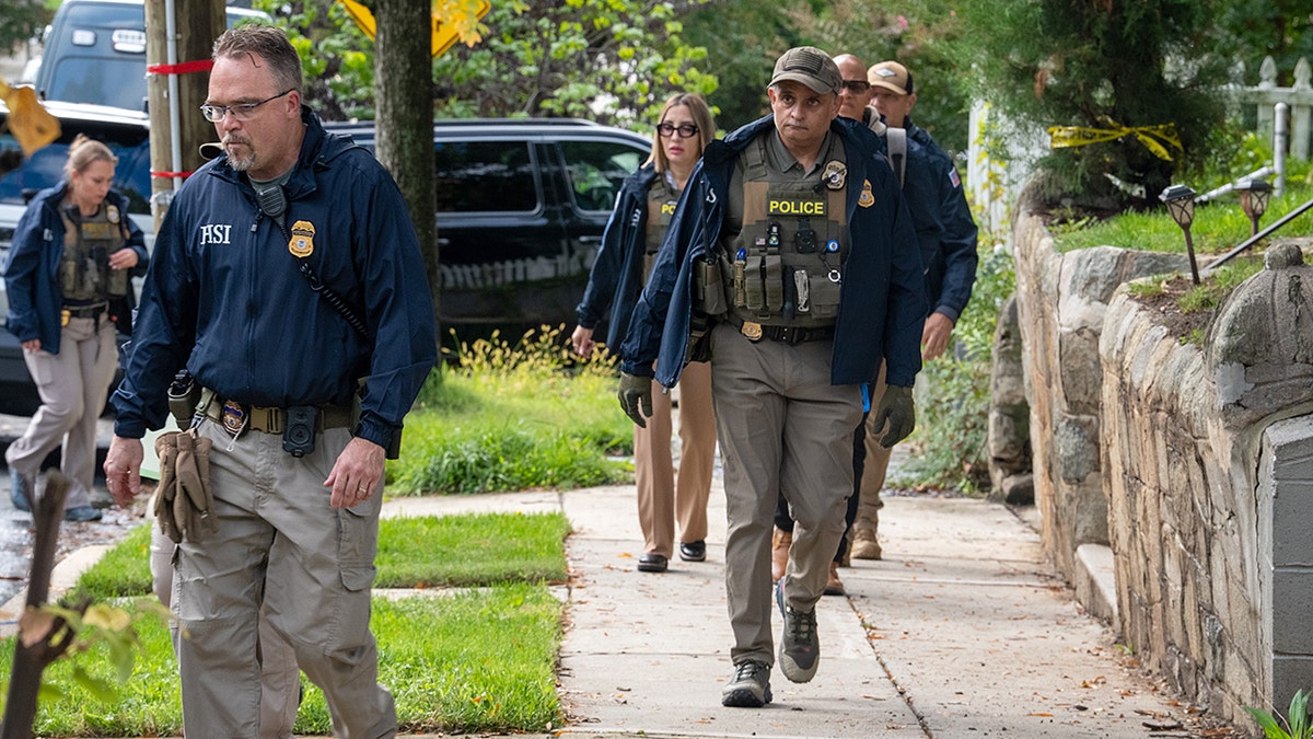 hsi-agents-walking-omar-house-2
