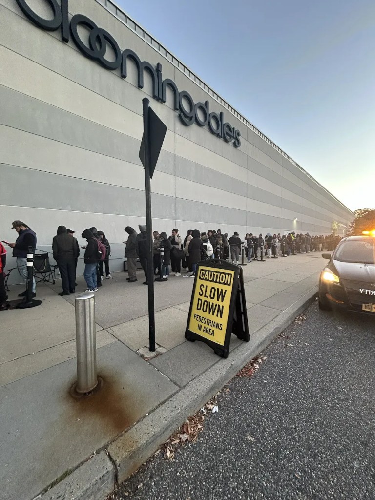 Lines gather outside of Walt Whitman Shops where the iPhone Duo sold out before 7:30 a.m. ET.
