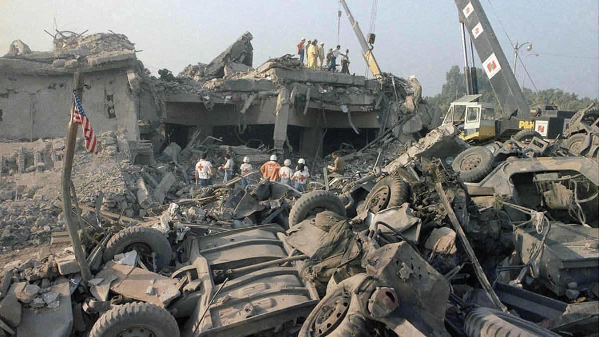 FILE - In this Oct. 23, 1983 file photo, the aftermath of the bombing of the U.S. Marines barracks in Beirut, Lebanon. The Supreme Court upheld a judgment allowing families of victims of Iranian-sponsored terrorism to collect nearly $2 billion. The court on Wednesday, April 20, 2016, ruled 6-2 in favor of relatives of the 241 Marines who died in a 1983 terrorist attack in Beirut and victims of other attacks that courts have linked to Iran.(AP Photo/Jim Bourdier, File)