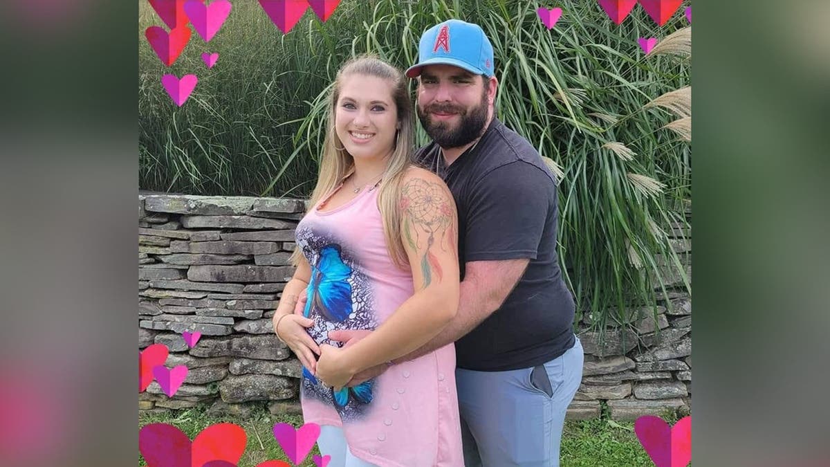 image shows couple hugging