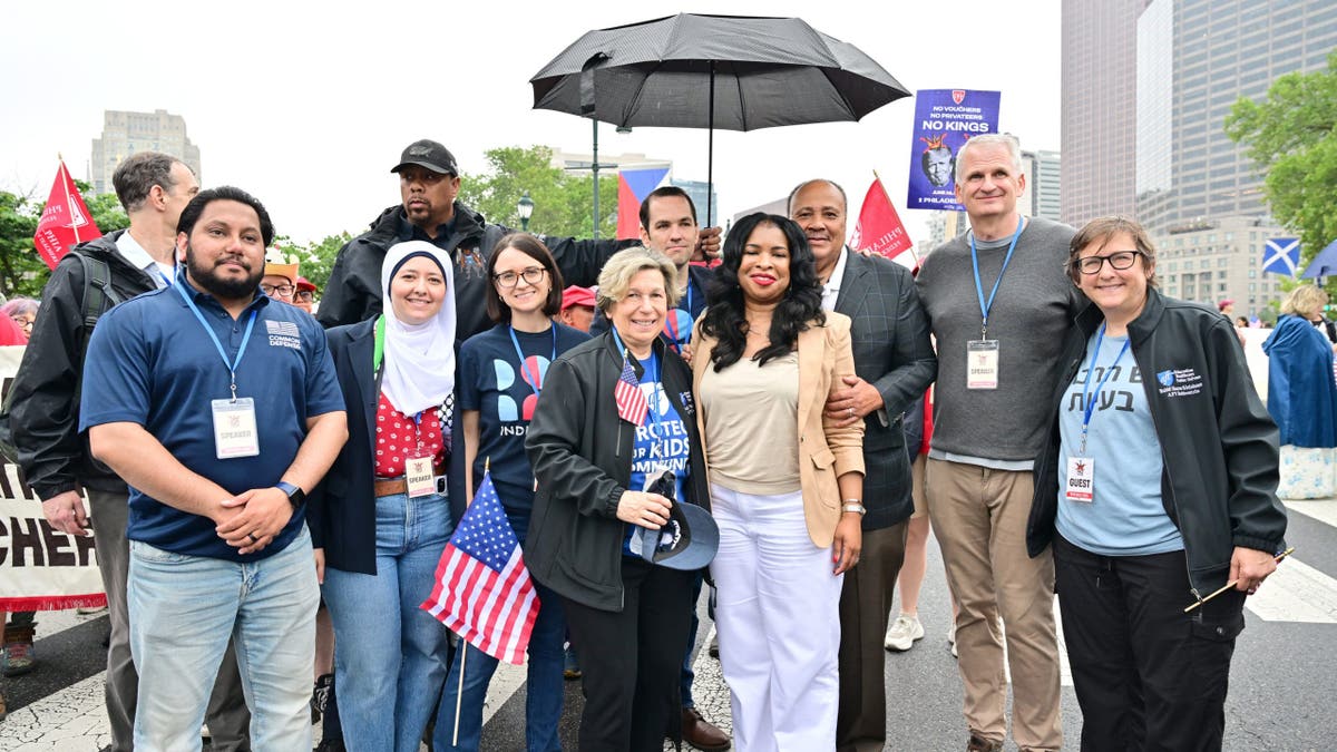 Organizers attend a protest at Love Park in Philadelphia.