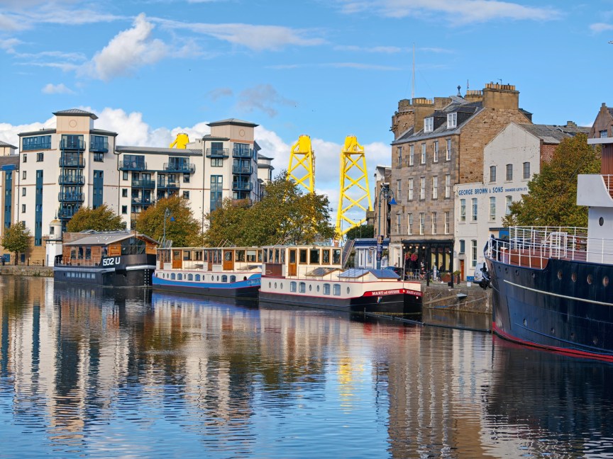 Image of buildings next to a river