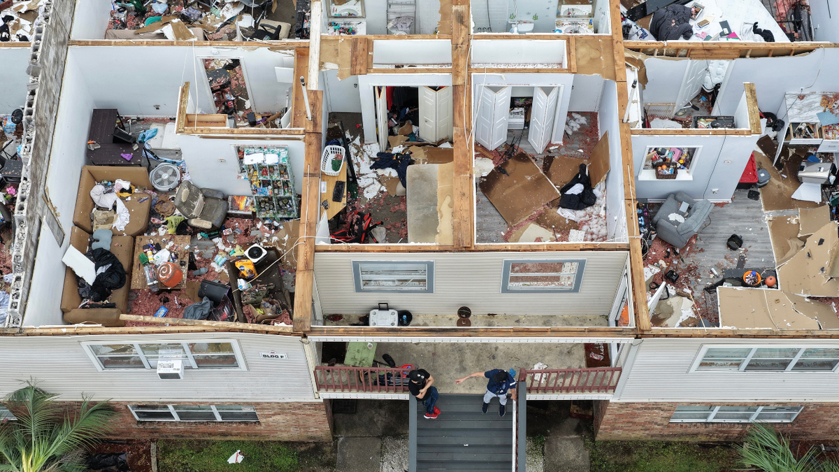 In an aerial view, an apartment complex is seen after the roof was blown off when Hurricane Isaias passed through the area on October 10, 2026, in Milton, Florida. Hurricane Isaias made landfall as the season's first Atlantic hurricane with category two winds.