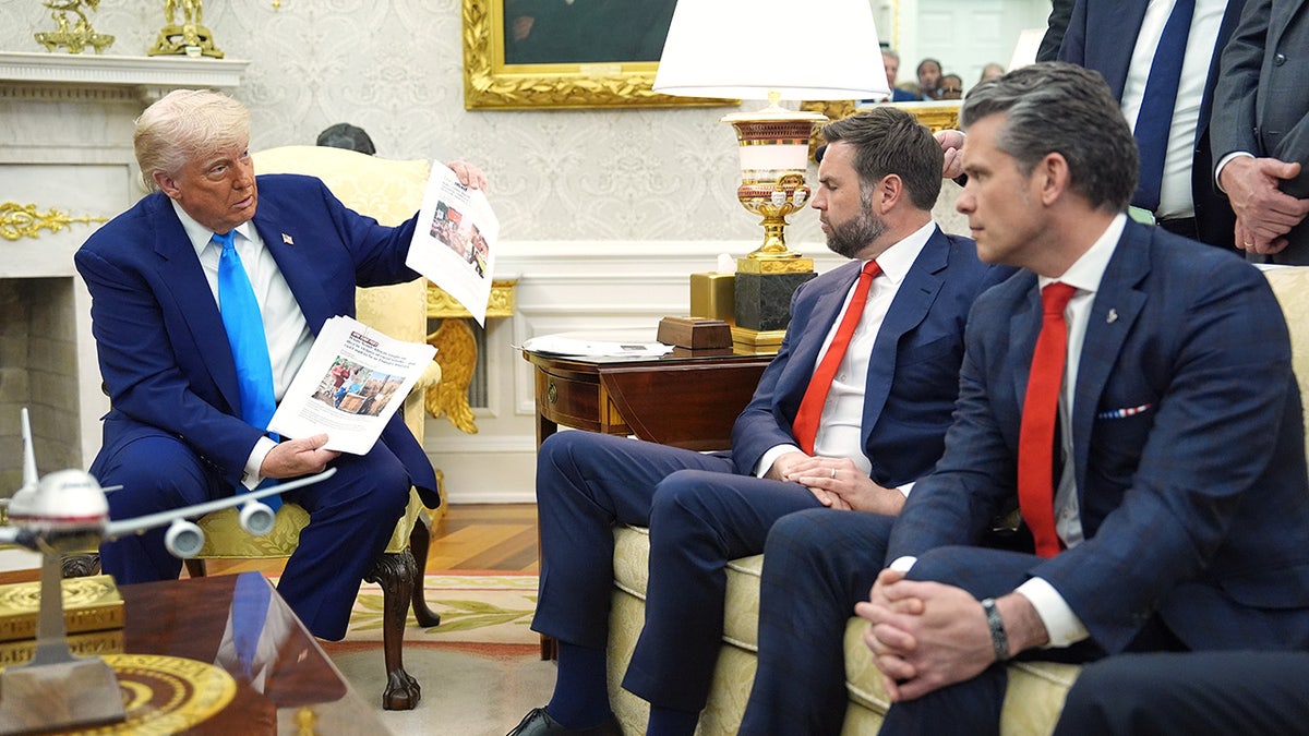 Trump shows documents at White House