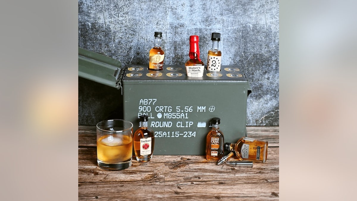Each day, open one of 12 whiskey shots inside this real, reusable ammo can. 